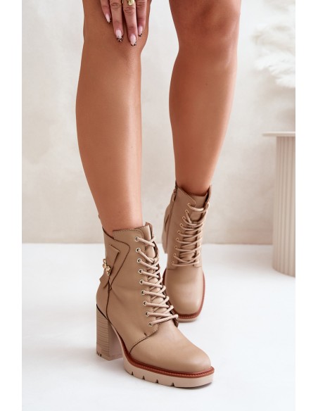 Insulated ankle boots on a heel with a golden detail beige Ivarisse