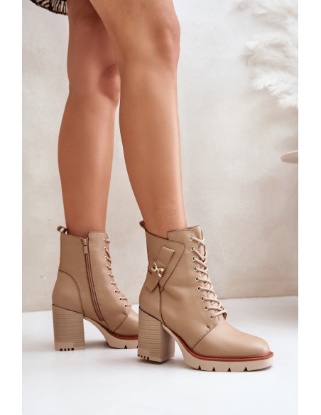 Insulated ankle boots on a heel with a golden detail beige Ivarisse