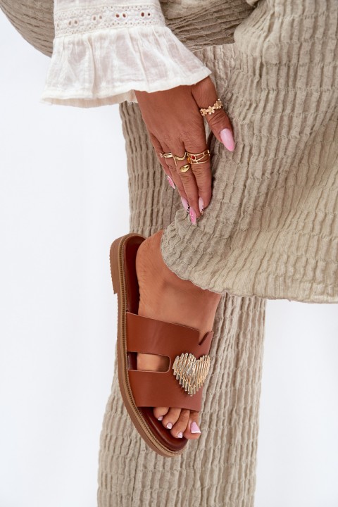 Womens sandals on a flat heel with a gold decoration Karinma